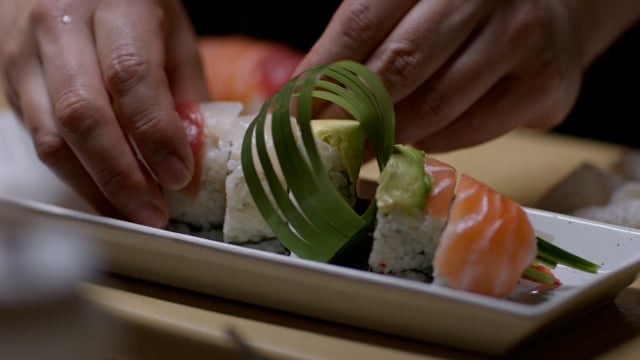 Sushi hand roll and nigiri platting at gourmet japanese restaurant.