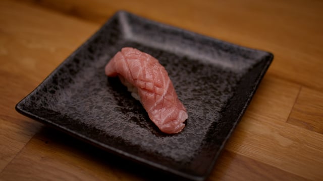 Tuna toro. Omakase sushi. Authentic Japanese sushi is prepared by an expert chef.