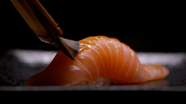 Salmon brushed to perfection. Authentic Japanese sushi is prepared by an expert chef.