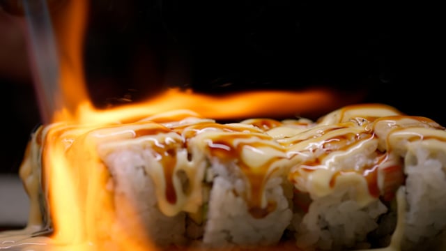 Authentic japanese sushi is finished with a torching. 
