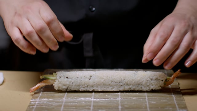 Sushi hand roll. Creating amazing sushi and sashimi at a high-end sushi restaurant.