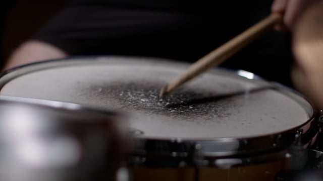 High energy drum roll during a jam session. 