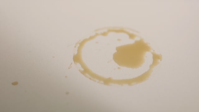 Wiping spilled liquid on a light surface. Personal hygiene video clip. 