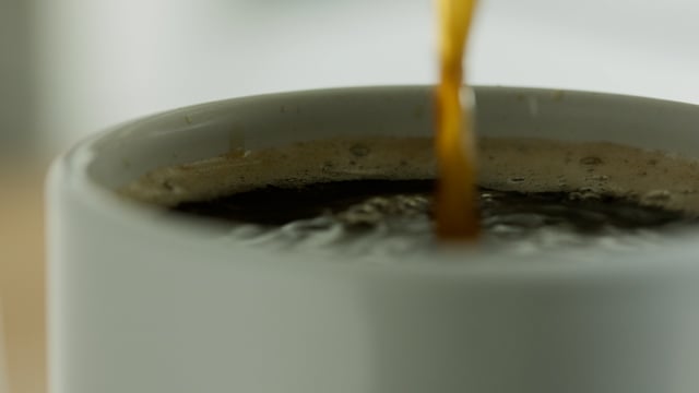 Fresh morning coffee. Coffee mug.