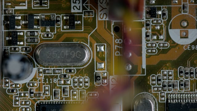 Computer microchip and motherboard closeup footage. High-tech technology.