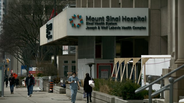 Mount Sinai Hospital Emergency Center Day. Day/Night matching establishing shots.  Emergency entrance. 