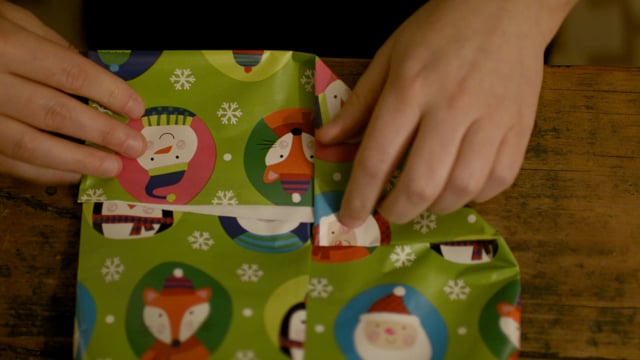 Wrapping a present for the holidays. 
