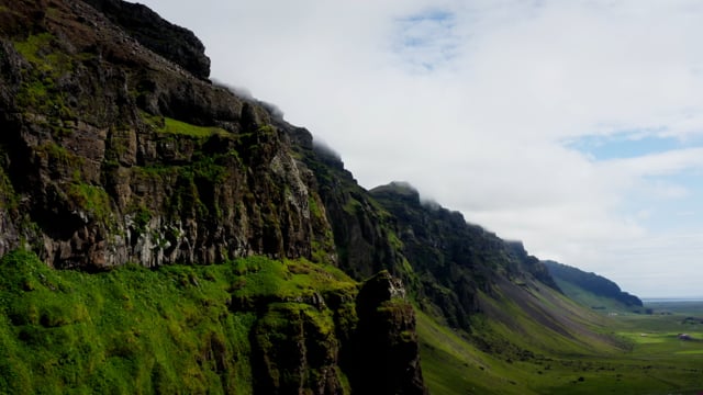 Cliff faces along Icelandic coastline. 
