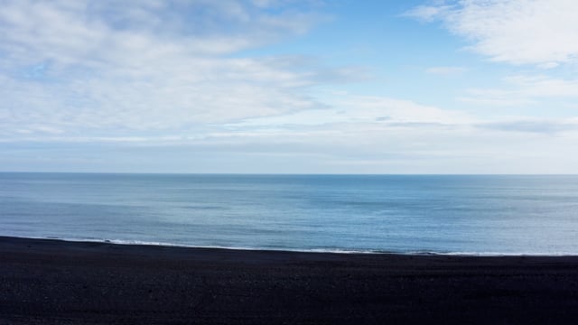 Black sand shoreline in Iceland. 