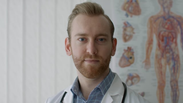 Portrait of a young caucasian male doctor. 