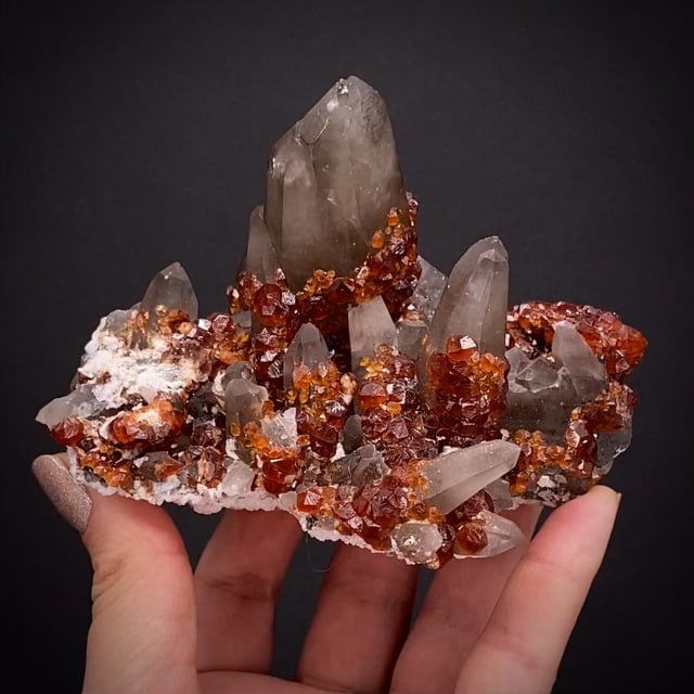 Quartz var. Smoky with Spessartine garnet