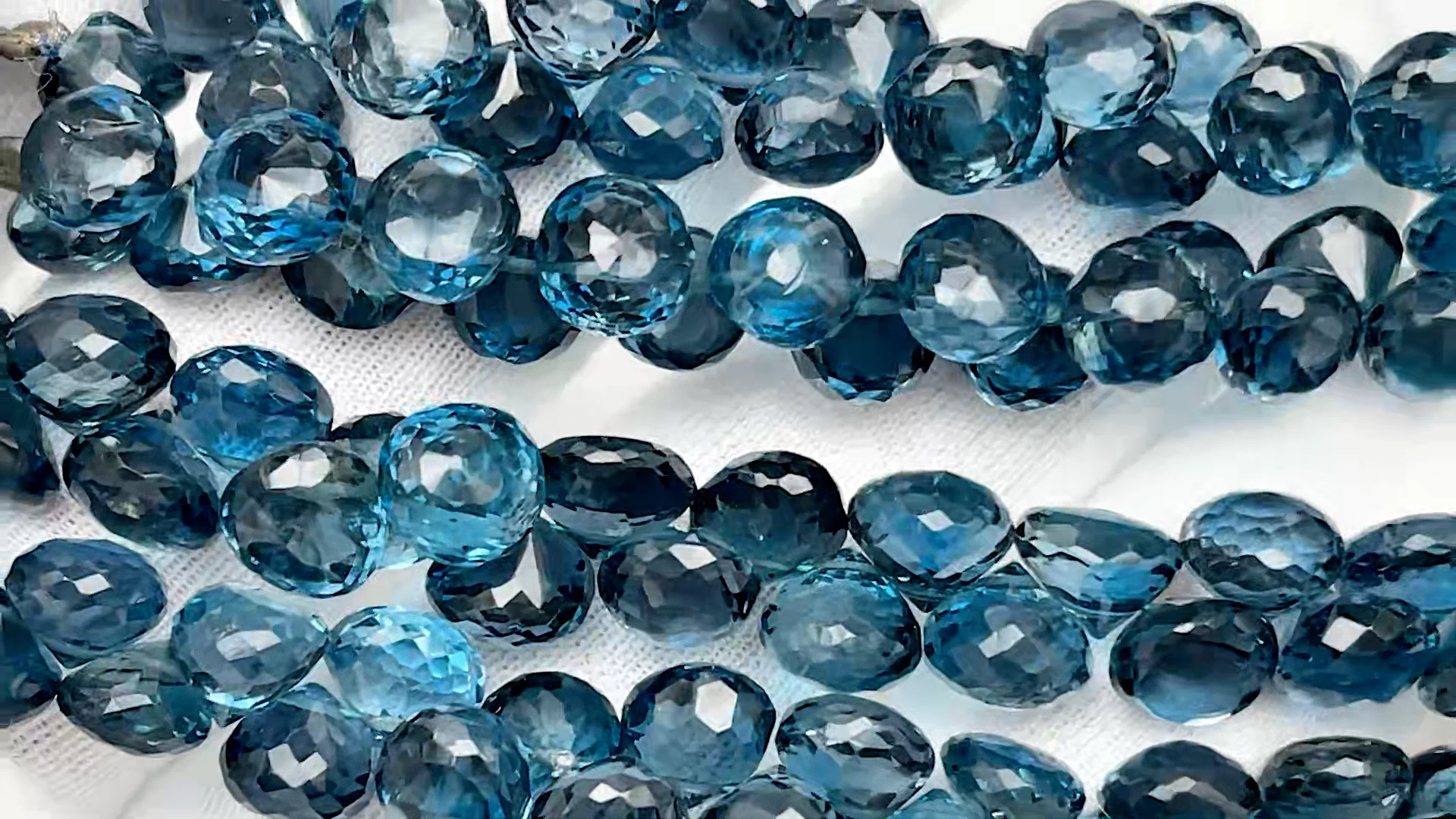 ロンドンブルートパーズ オニオンカット 5～6mm【1連販売