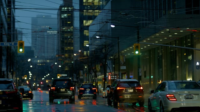Streets with traffic at night. Night view. Busy urban centre. 