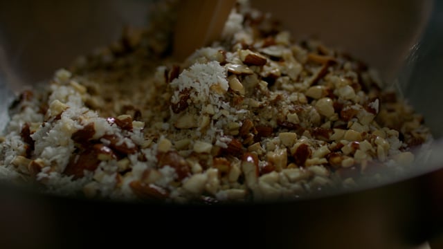 Making a healthy breakfast granola mix. Homemade and healthy food. 