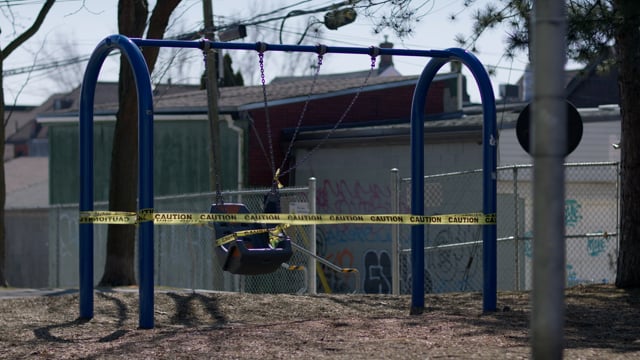 Pandemic social distancing closures. Covid-19 pandemic. Park closed with tape. Shot in 4k.