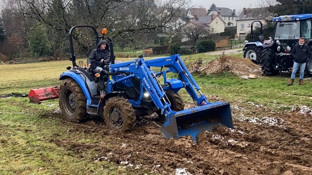 S 50 in Mud with Front Loader