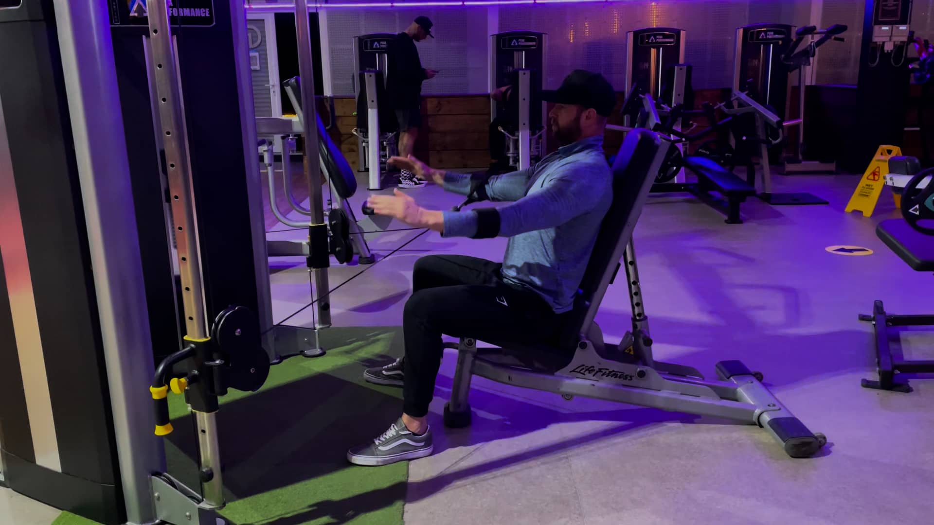 Seated Cuffed Crucifix Lateral Raise on Vimeo