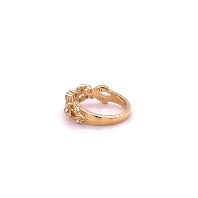 0.32 Karat Memoire Ring mit kleinen Blättern aus Gelbgold mit runden Diamanten