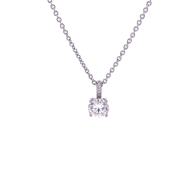 0.90 carat solitaire pendant in yellow gold with four prongs and round diamonds