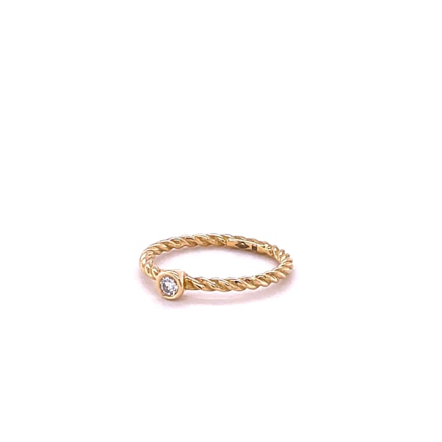 0.07 carat diamond stackable twisted ring in yellow gold