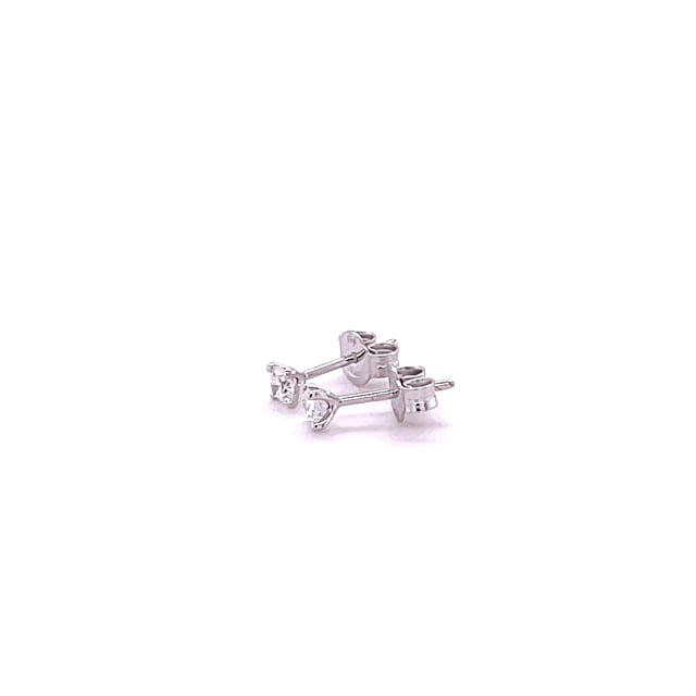 0.30 carat classic diamond earrings in platinum with four prongs