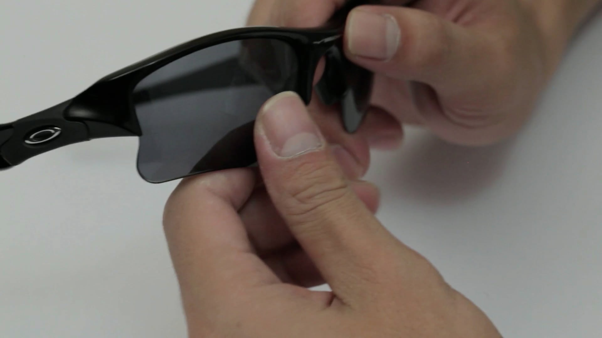 Oakley Flak Jacket XLJ Lenses Installation Instructions on Vimeo