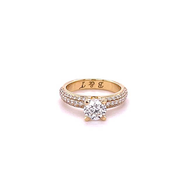 0.70 karaat solitaire ring (half gezet) in geel goud met zijdiamanten