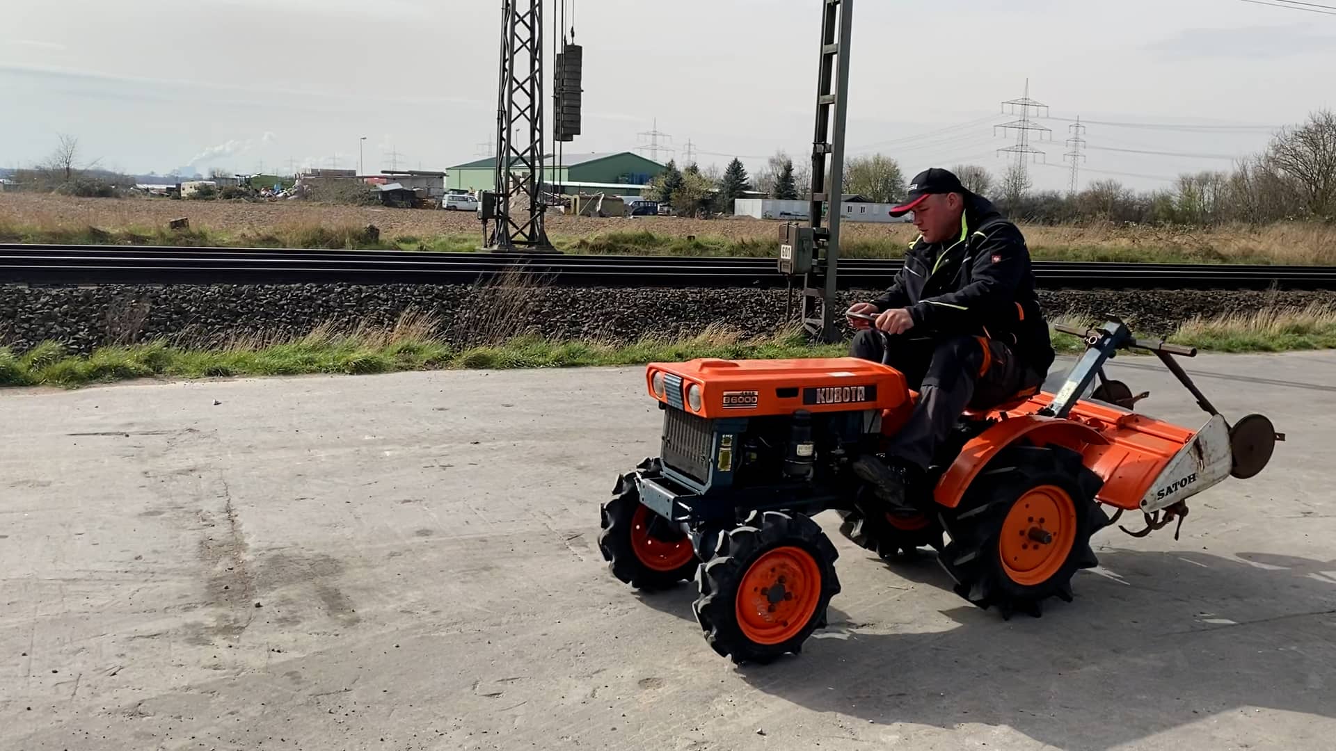 Kubota B6000 4WD Compact Tractor, Rotary Tiller on Vimeo