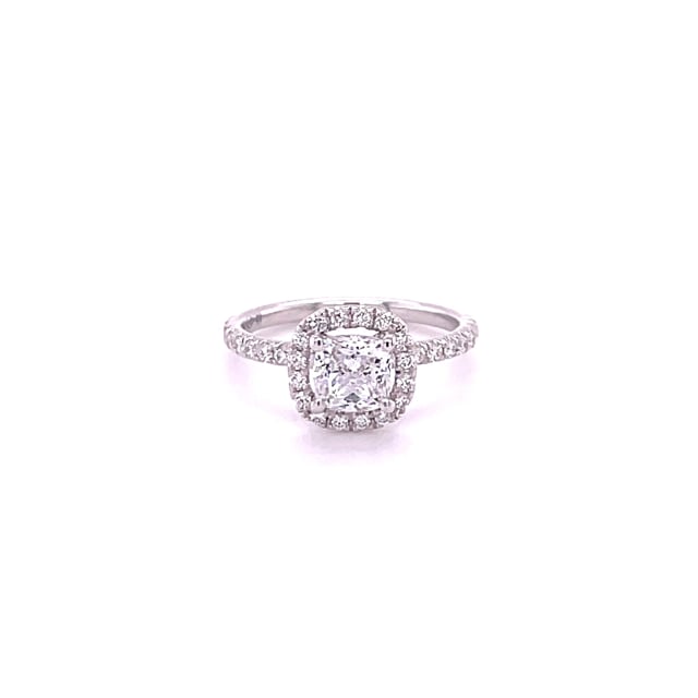 1.00 carat solitaire halo ring with a cushion diamond in white gold with round diamonds