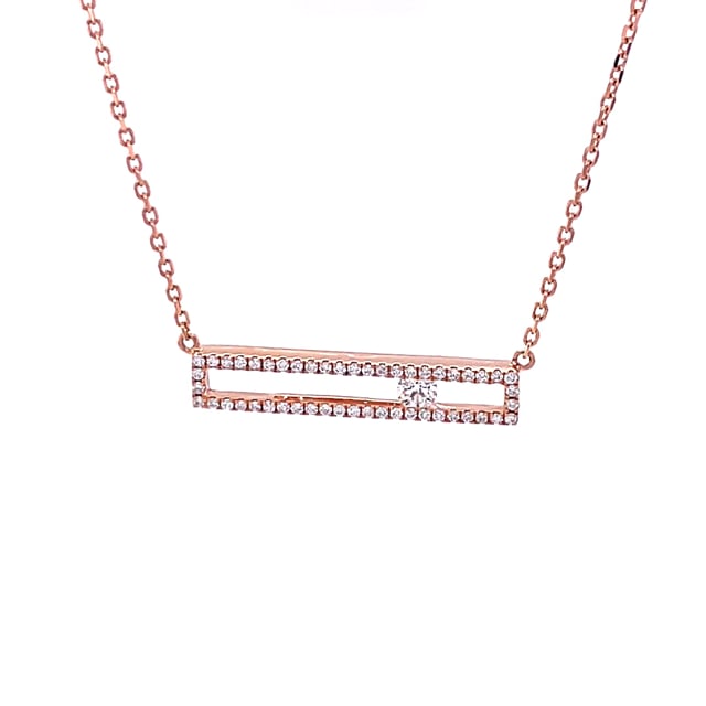 0.30 carat necklace in red gold with a floating round diamond