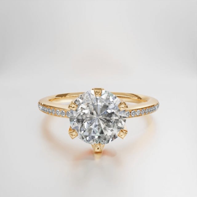 1.00 carat solitaire ring in yellow gold with side diamonds