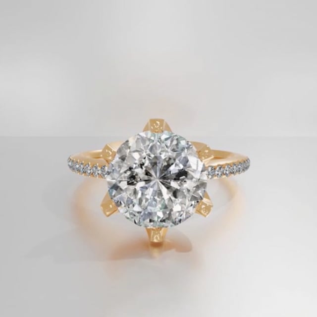 3.00 carat solitaire ring in yellow gold with side diamonds