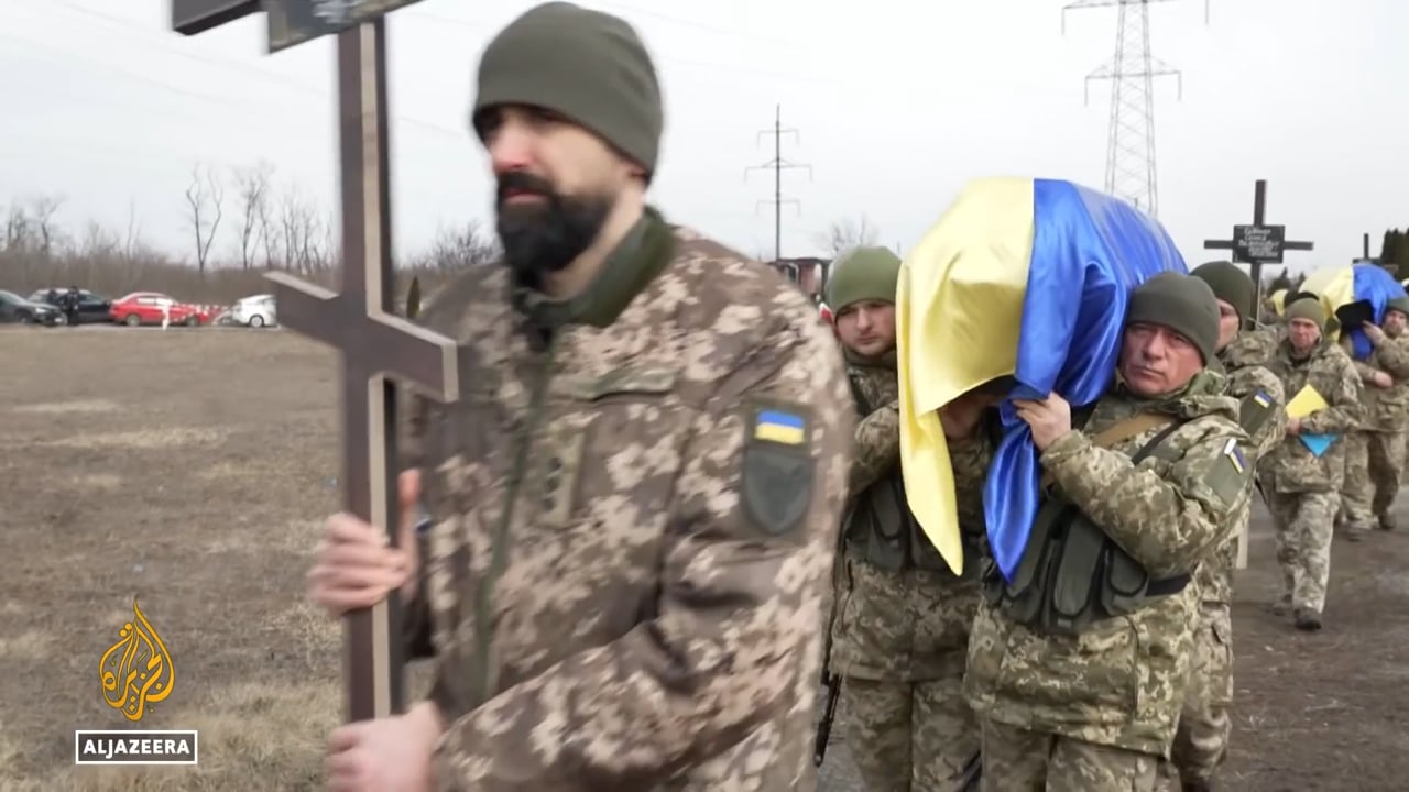 War in Ukraine - Families in mourning as Ukrainian soldiers are buried - Dnipro - 18th March 2022