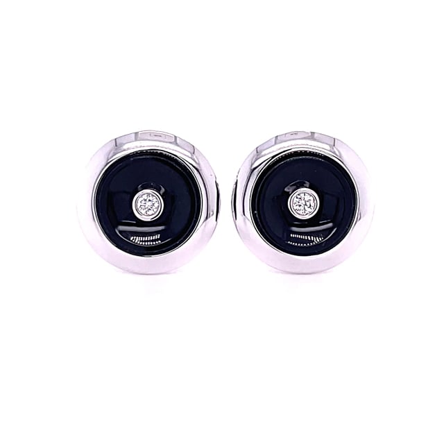 Platinum cufflinks with onyx and a central diamond