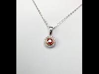 Natural Unheated Ruby Pendant with Diamond Halo in 18K Gold 1982393