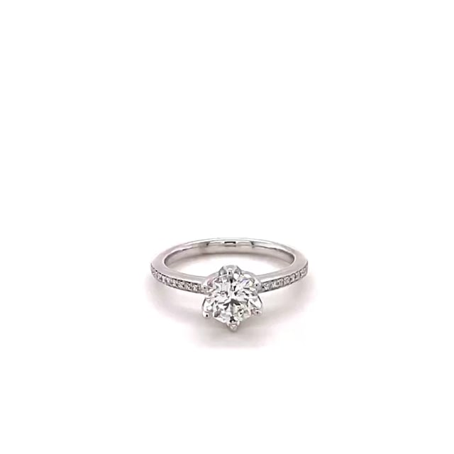 1.00 carat solitaire ring in white gold with side diamonds