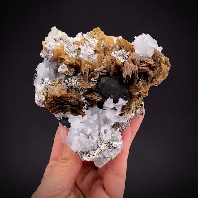 Roweite with Magnetite and Olshanskyite