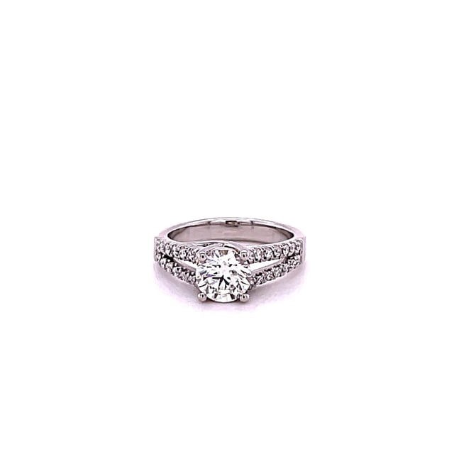 0.90 karaat solitaire ring in platina met zijdiamanten