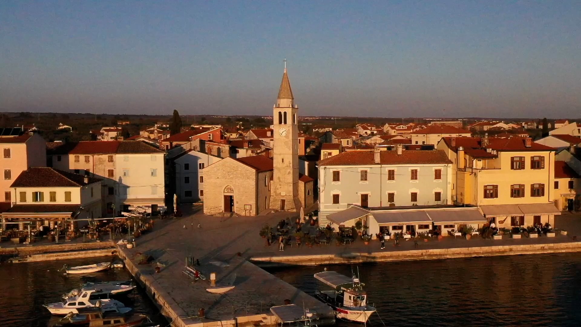 Fužine during sunset church on square