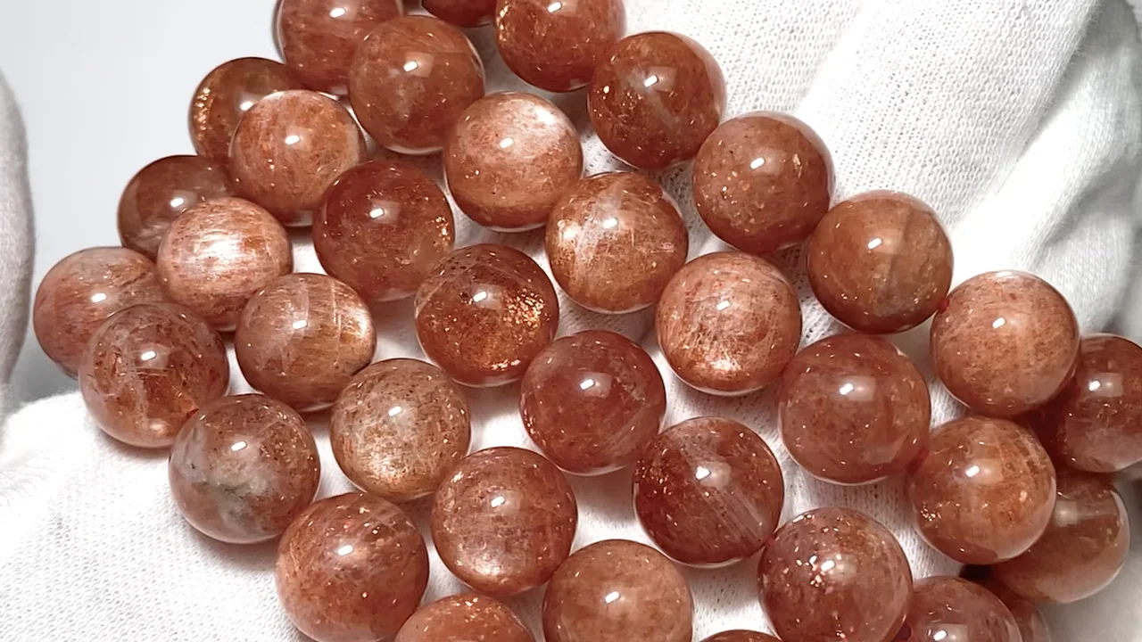 動画】サンストーンAA++ ラウンド12mm 1連(ブレス) - 天然石ビーズ