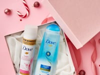Pink Christmas gift box stop framing for Dove