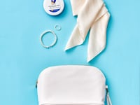 White beauty bag stop framing for Dove