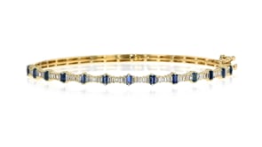 60 ct. t.w. Sapphire and .36 ct. t.w. Diamond Bangle Bracelet in 14kt Yellow Gold