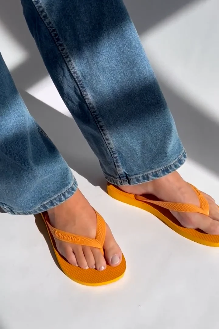 Orange havaianas best sale flip flops