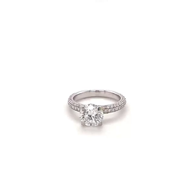 1.50 carat solitaire ring (half set) in platinum with side diamonds