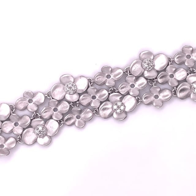 0.75 carats bracelet design fleurs en or blanc avec diamants