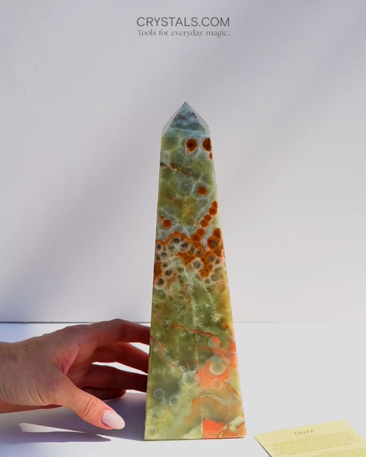 Black onyx obelisk crystal tower — polished crystal decor