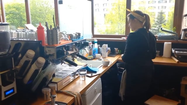 Barista making coffee