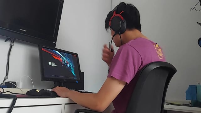 Young man playing video games