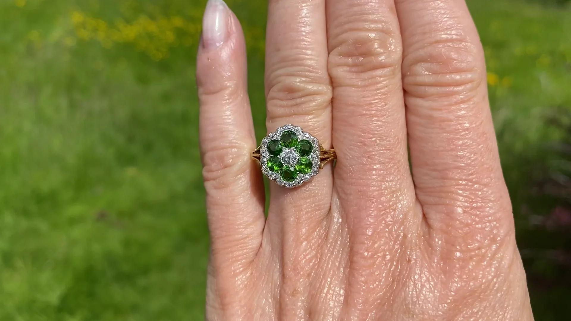 EDWARDIAN 1.31 CARAT DEMANTOID GARNET DIAMOND CLUSTER RING CIRCA 1905